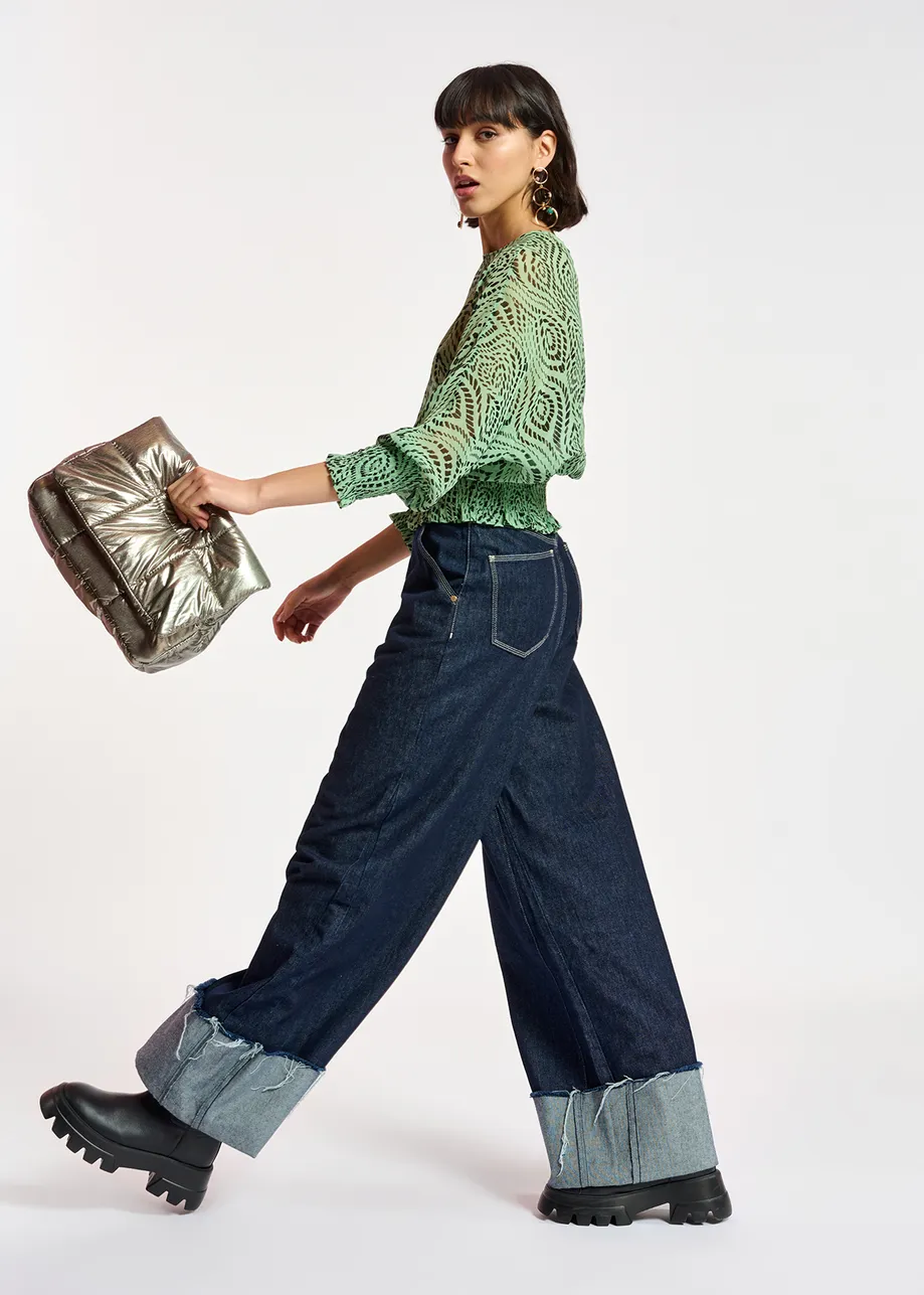 Mint green smocked top with geometric print
