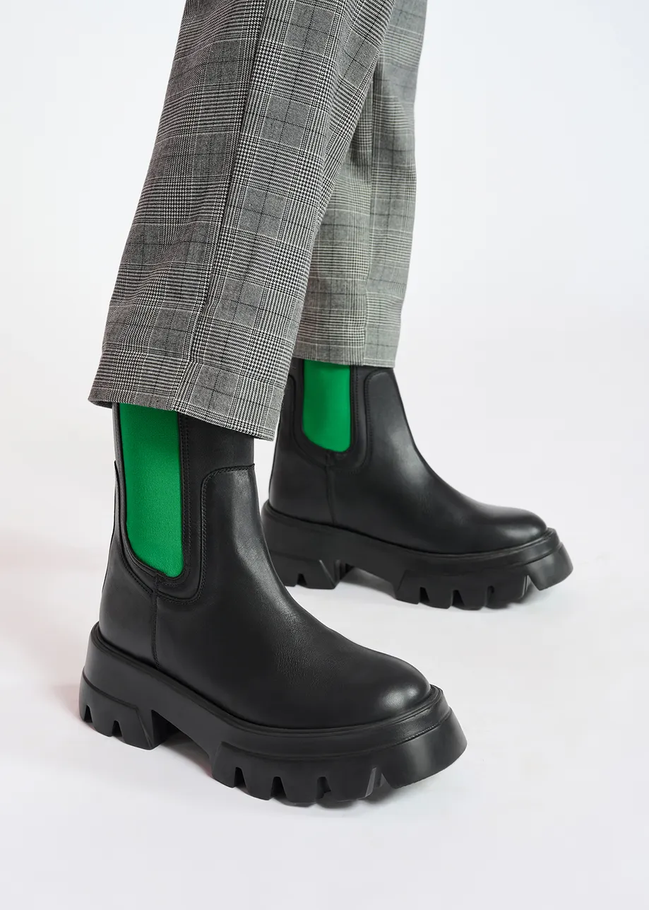 Black chunky leather chelsea boots with green side tabs