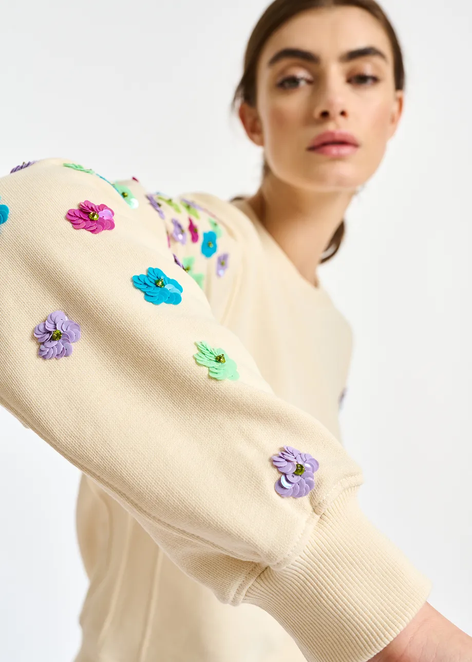 Off-white sweatshirt with multicolor sequin embroideries