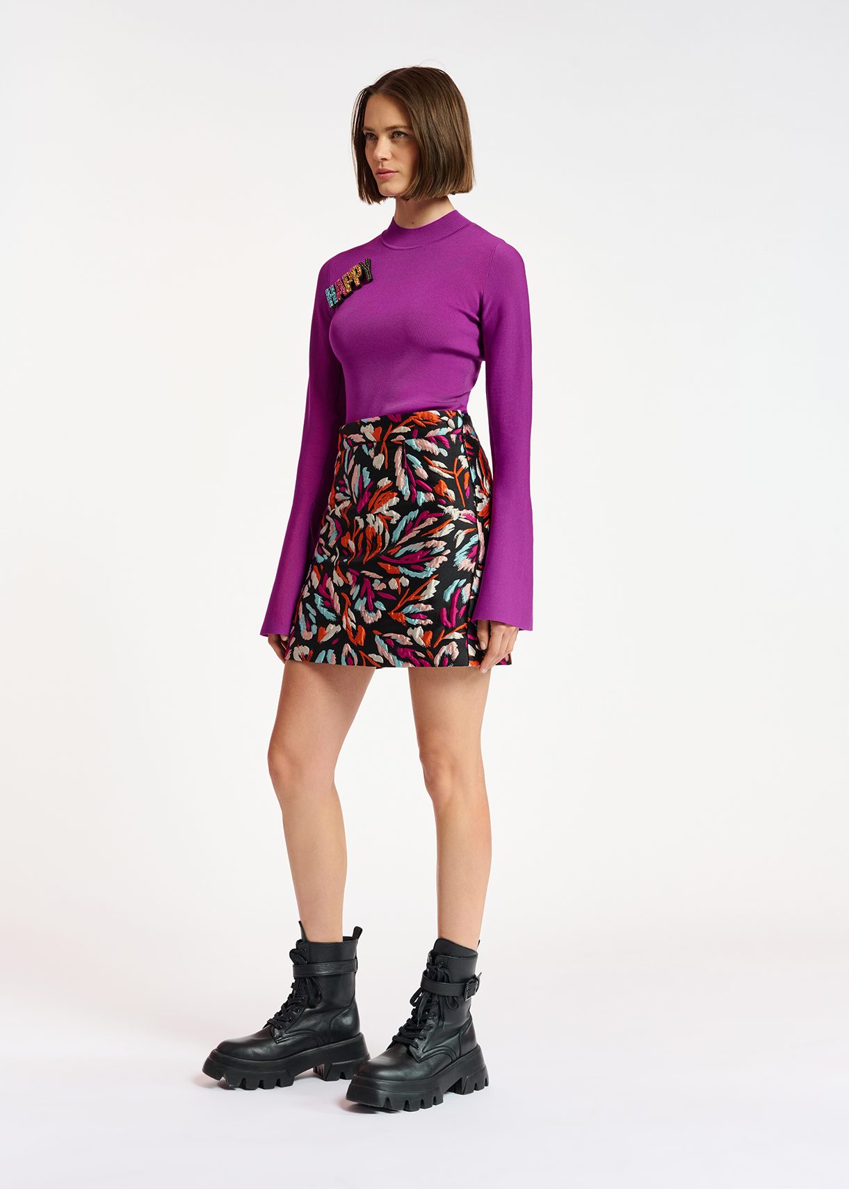 Purple slim-fit knit sweater with trumpet sleeves