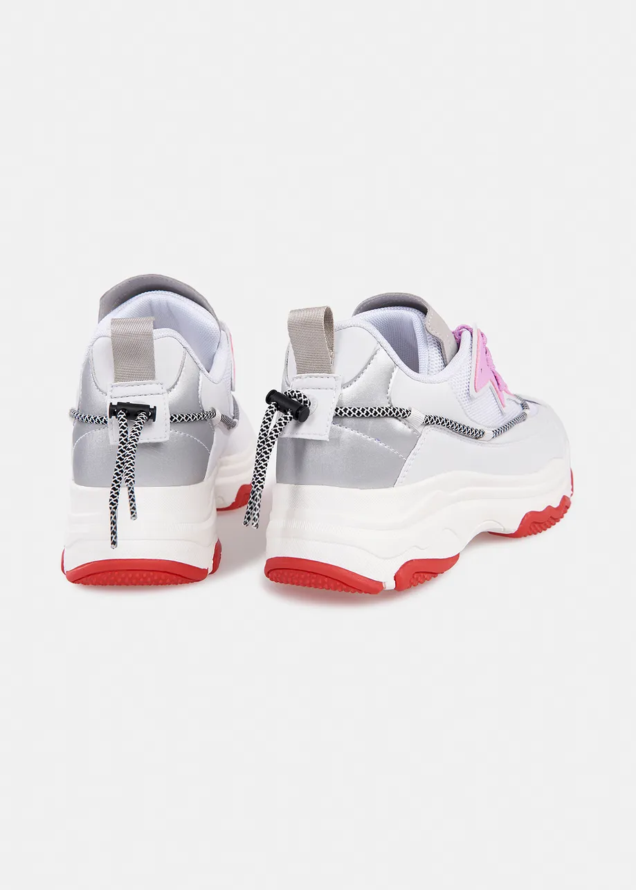 White sneakers set on chunky soles