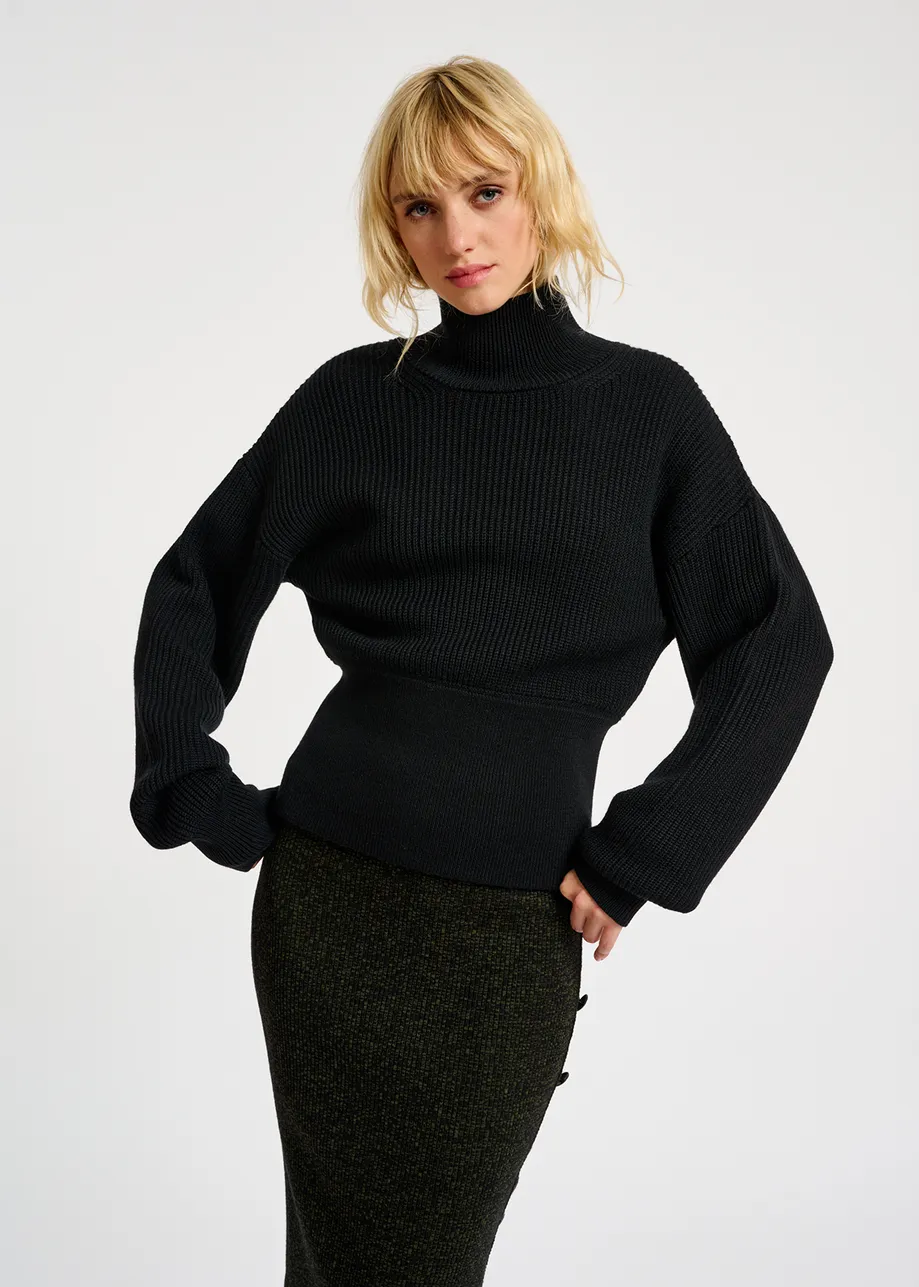 Black turtleneck sweater with fitted waist