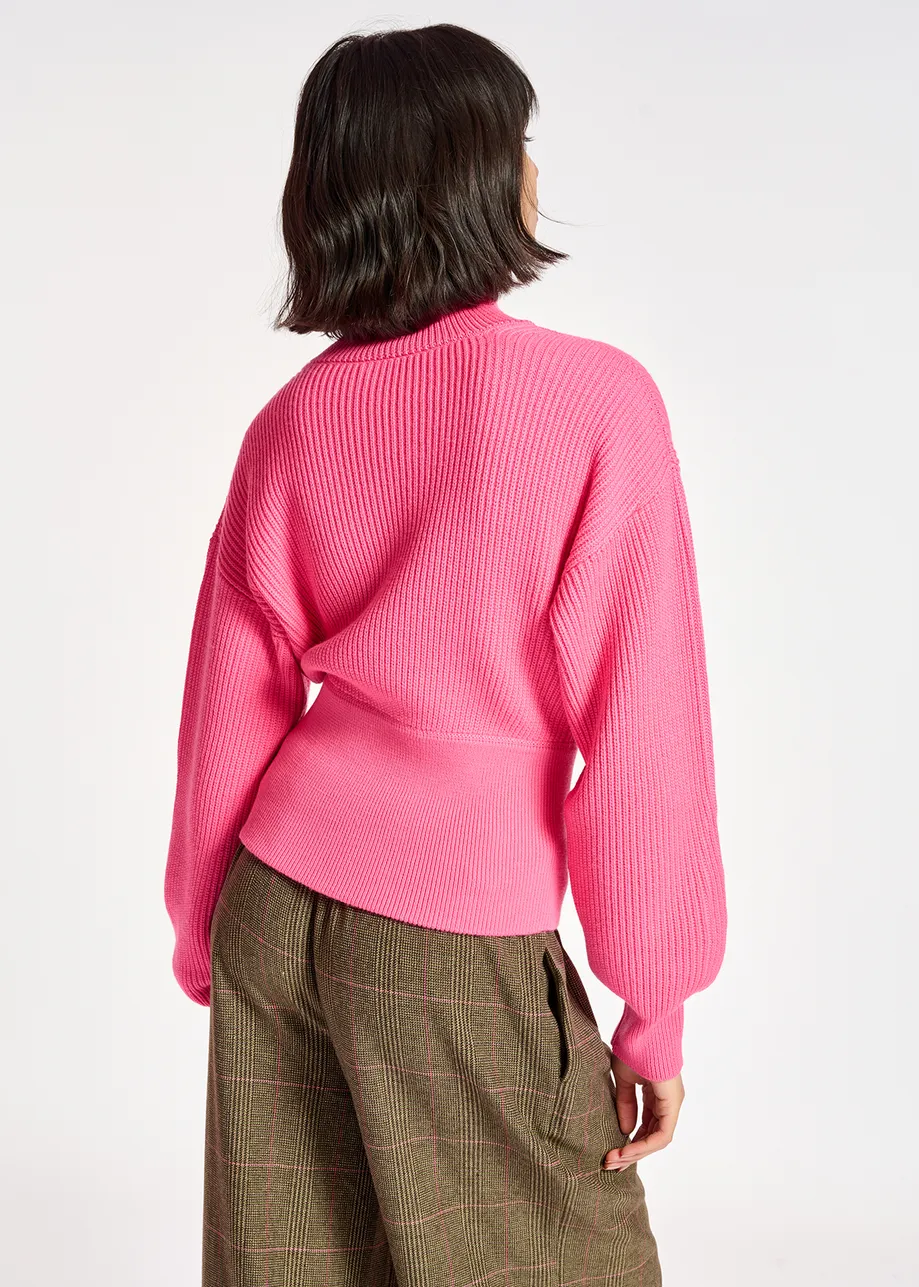 Neon pink turtleneck sweater with fitted waist