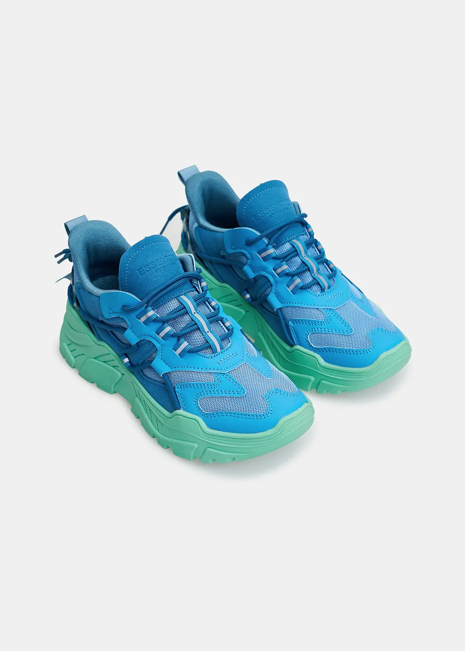 Blue sneakers set on chunky mint green soles