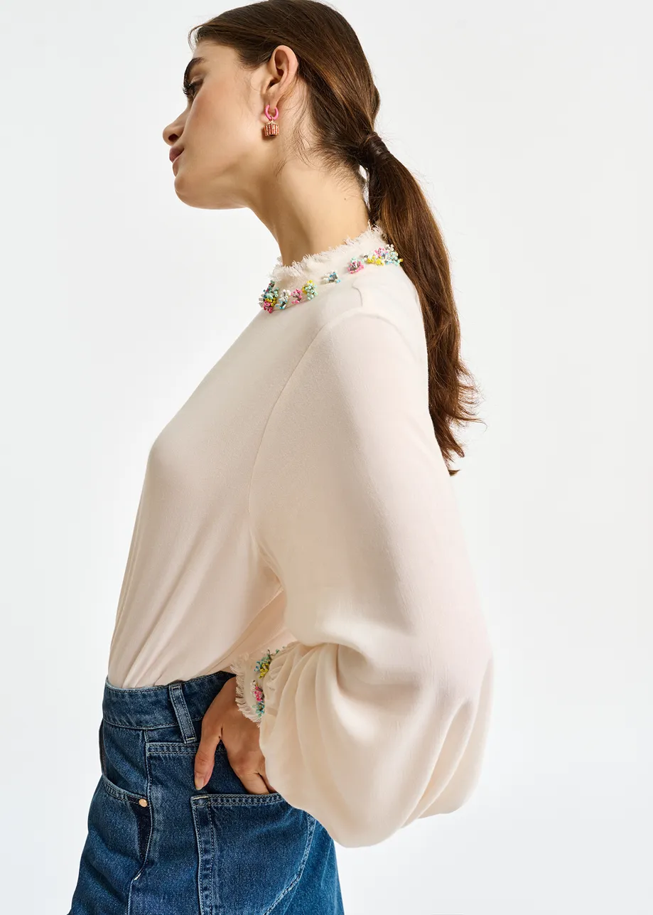 Off-white high neck top with bead embellishments