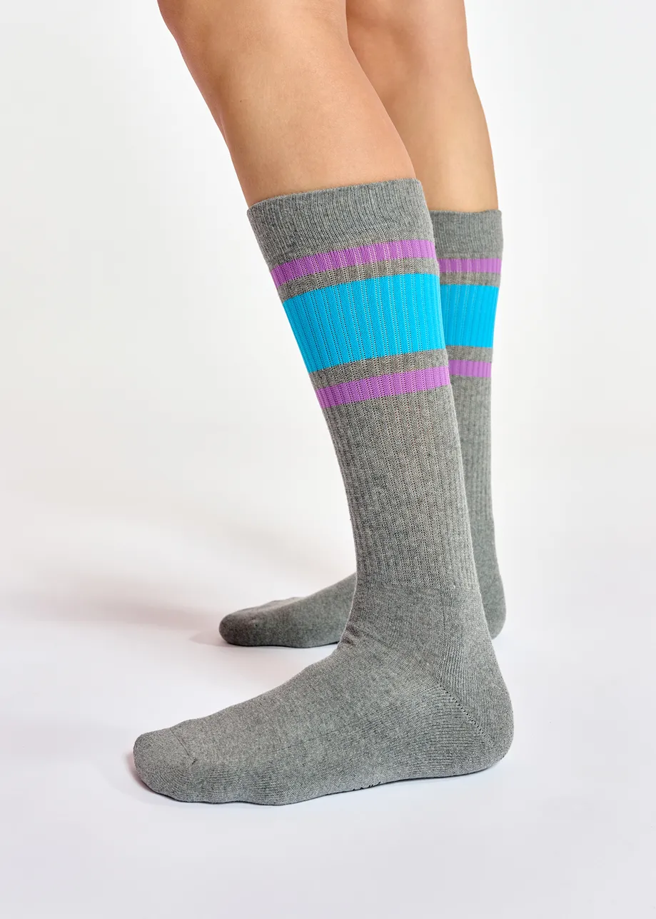 Grey socks with blue and purple stripes