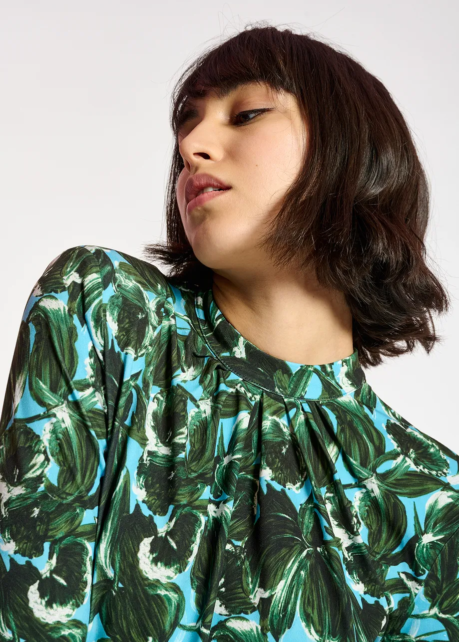 Blue and dark green leaf-print mock neck top