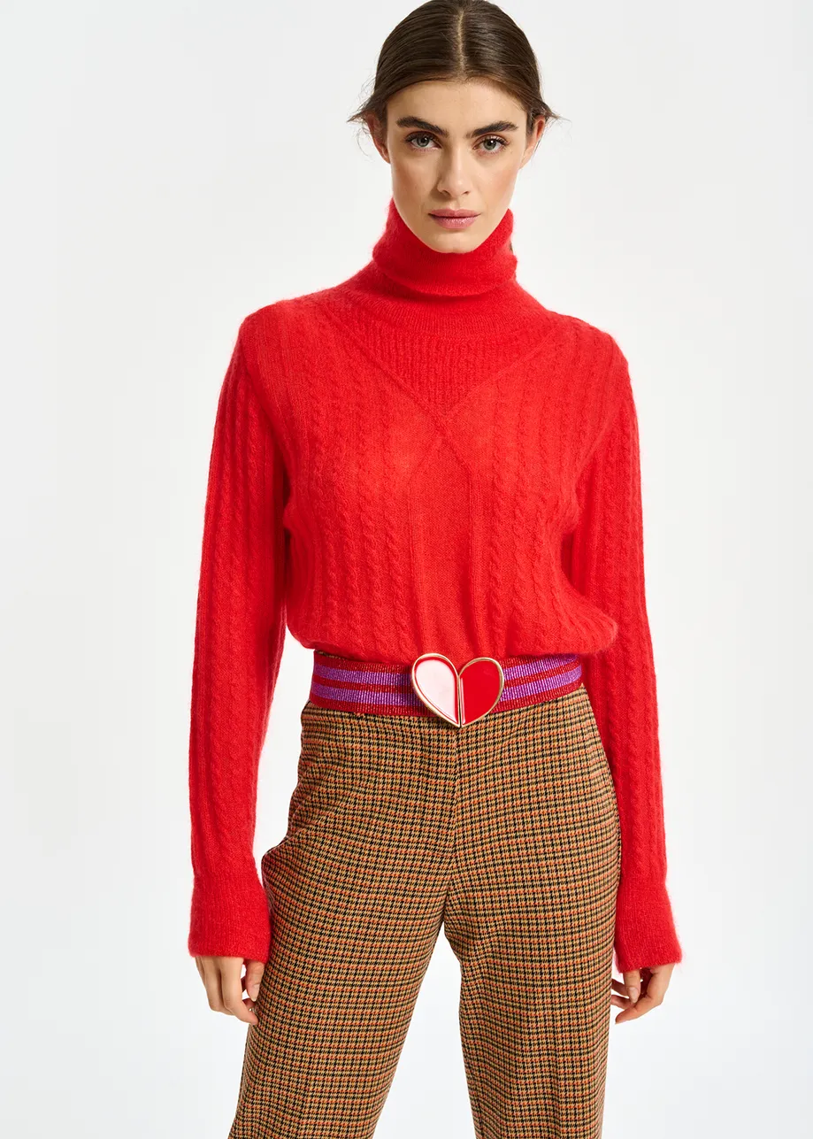 Red cable-knitted turtleneck sweater