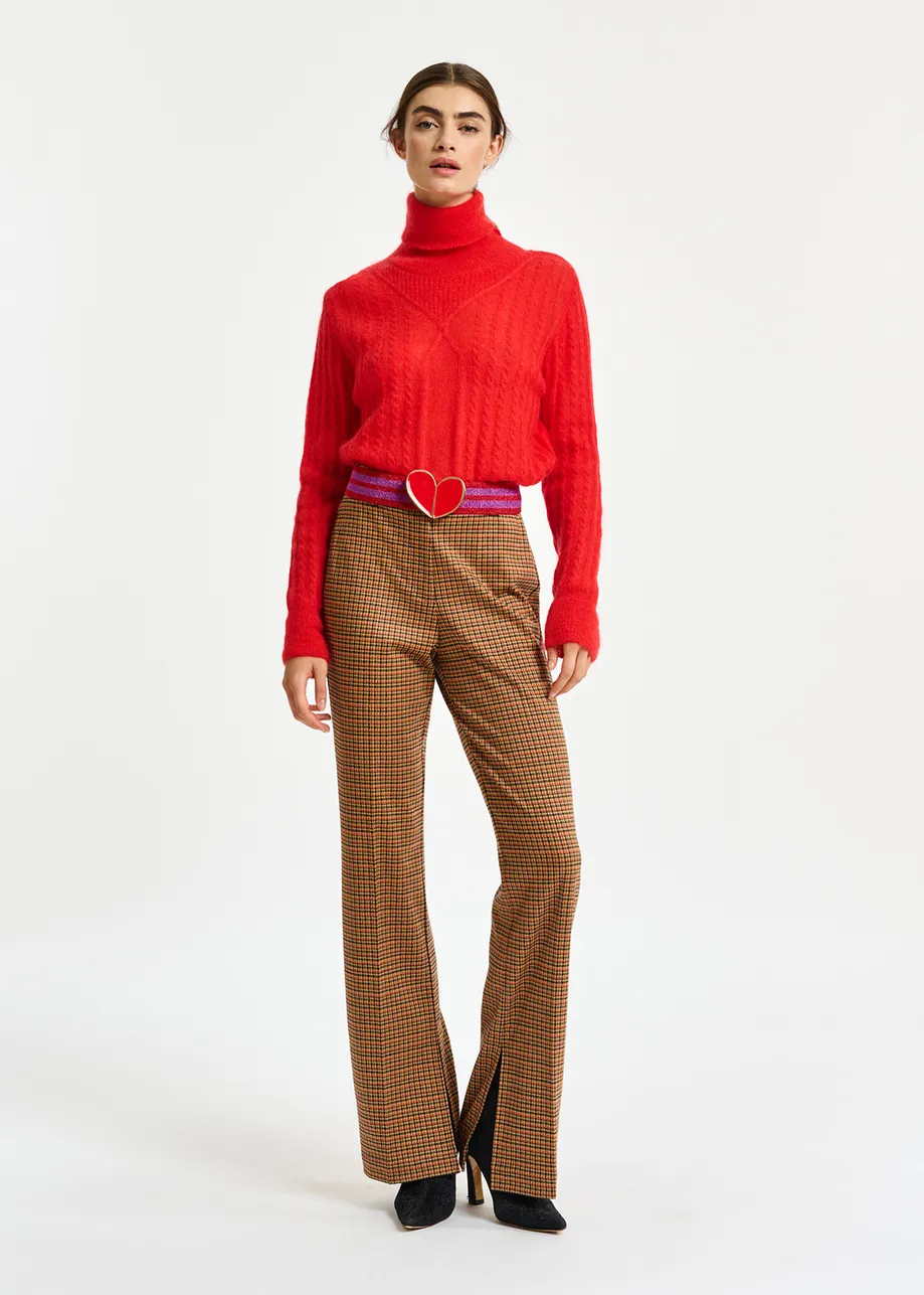 Red cable-knitted turtleneck sweater