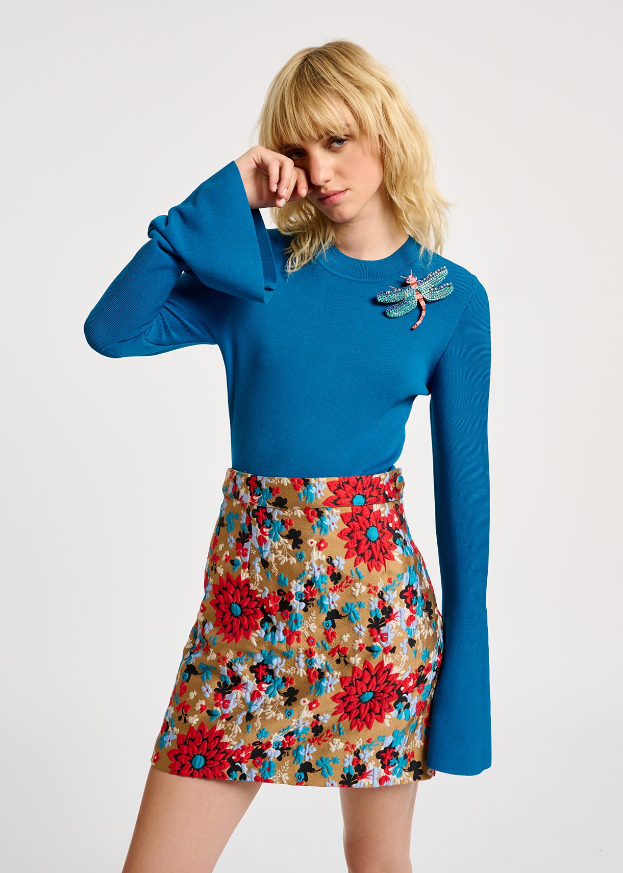 Blue slim-fit knit sweater with trumpet sleeves