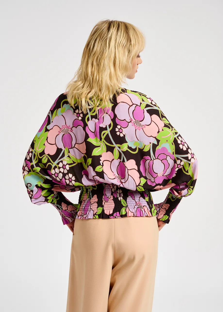 Black smocked top with floral print