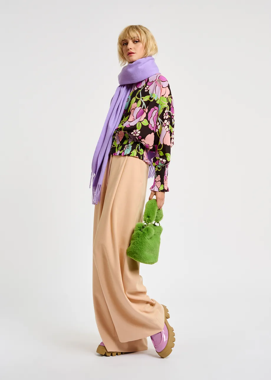 Black smocked top with floral print