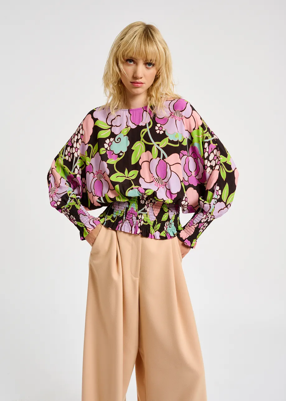 Black smocked top with floral print