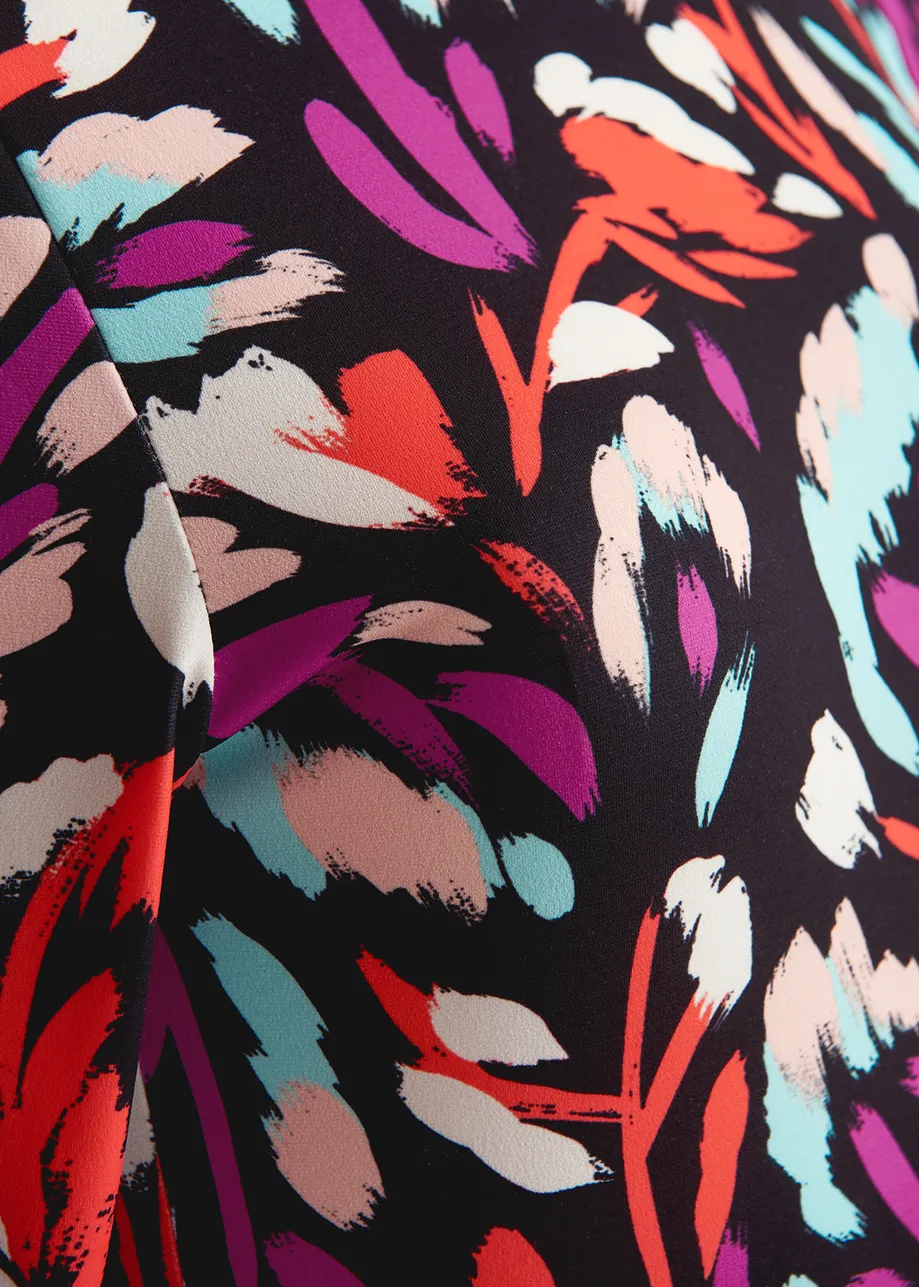 Black, coral red and purple abstract-print turtleneck top