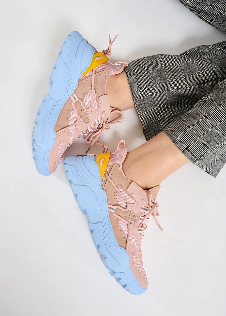 Vintage pink sneakers set on chunky blue soles