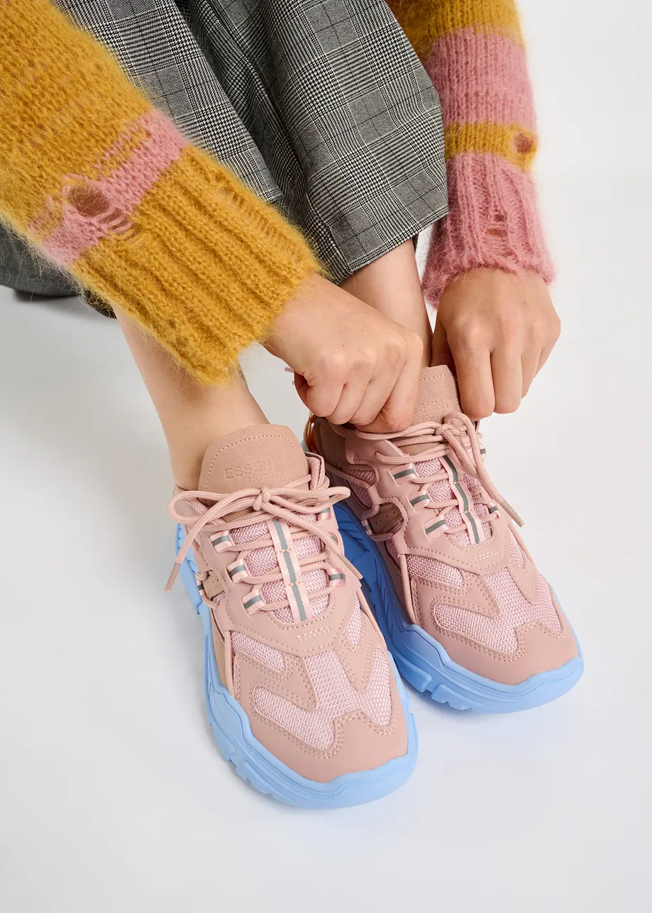 Vintage pink sneakers set on chunky blue soles