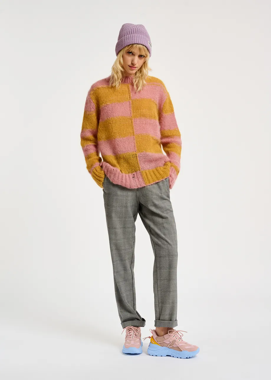 Vintage pink sneakers set on chunky blue soles