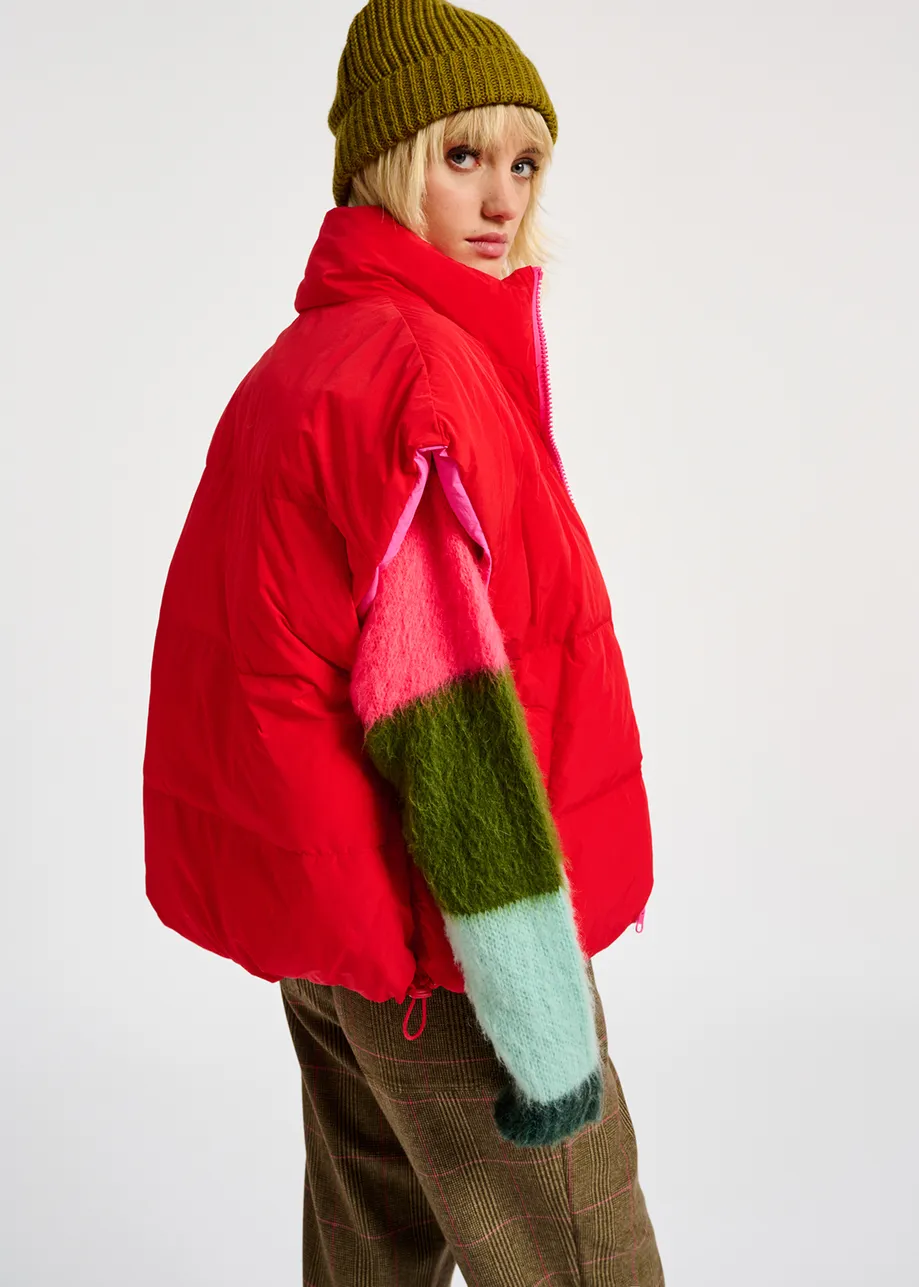 Neon pink and red reversible puffer vest