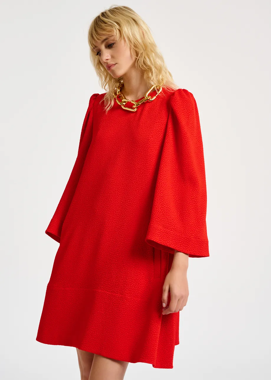 Red mini dress with trumpet sleeves