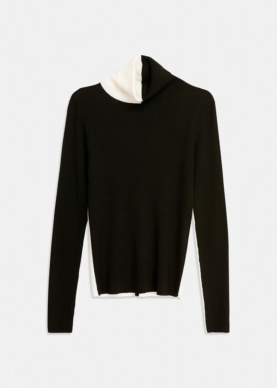 Black and white two-tone turtleneck knit sweater