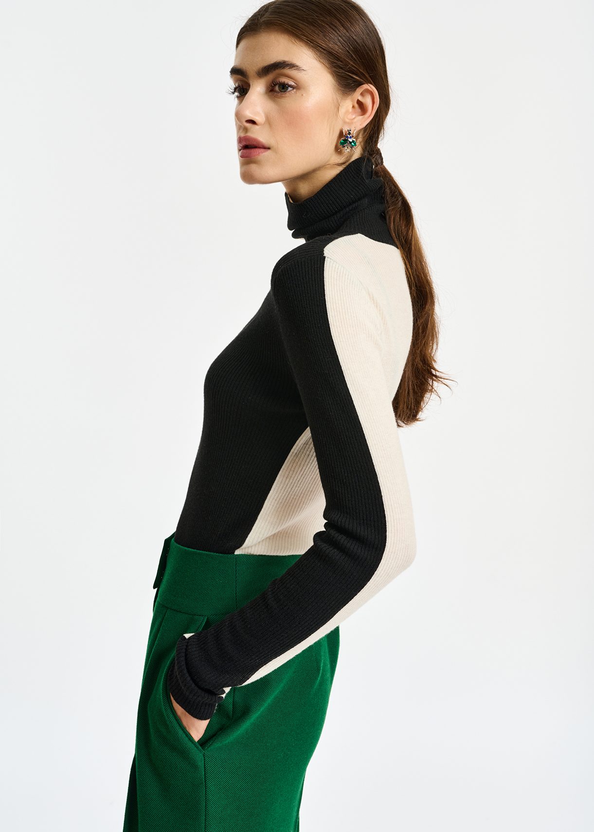 Black and white two-tone turtleneck knit sweater