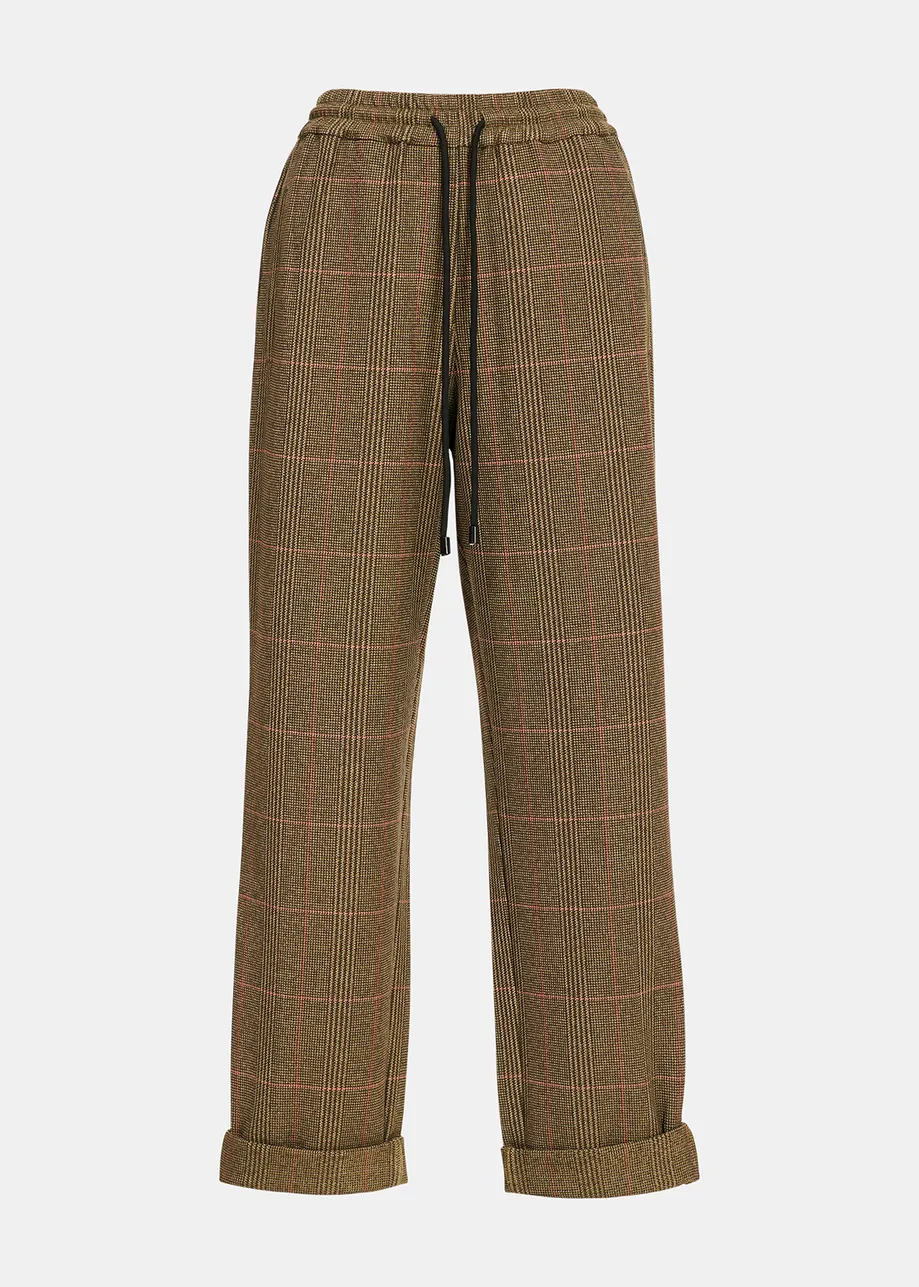 Brown pants with beige and pink check motif