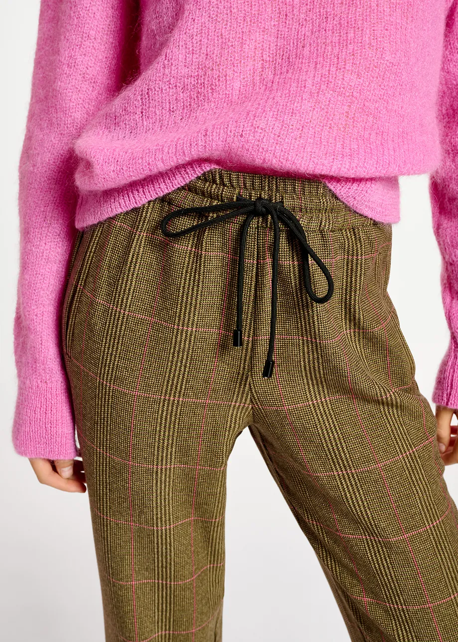 Brown pants with beige and pink check motif