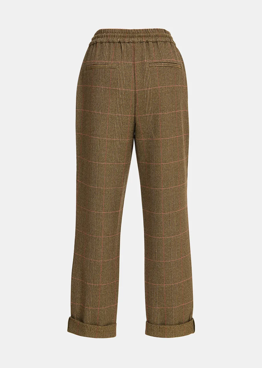 Brown pants with beige and pink check motif