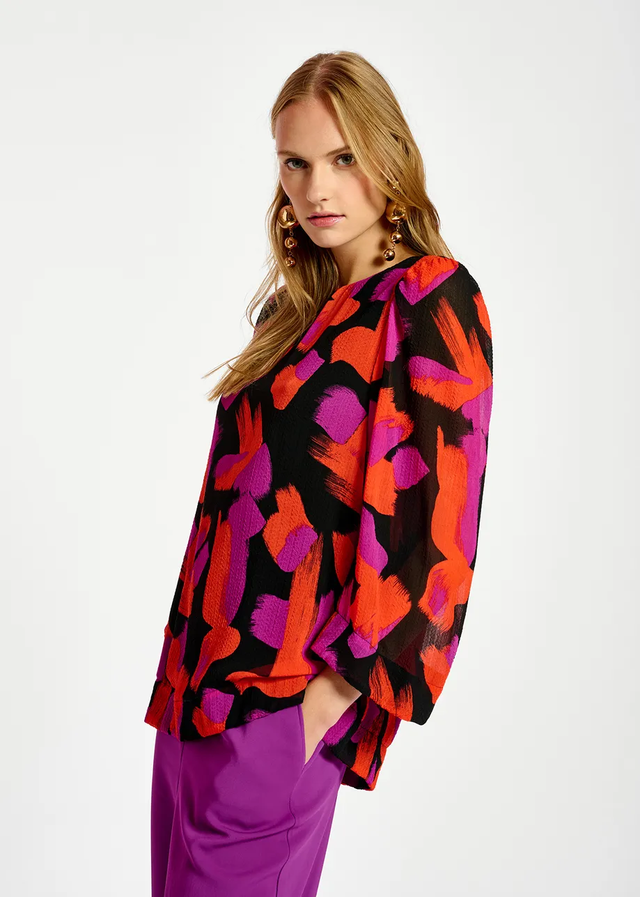 Black, orange and purple abstract-print top with puffed shoulders