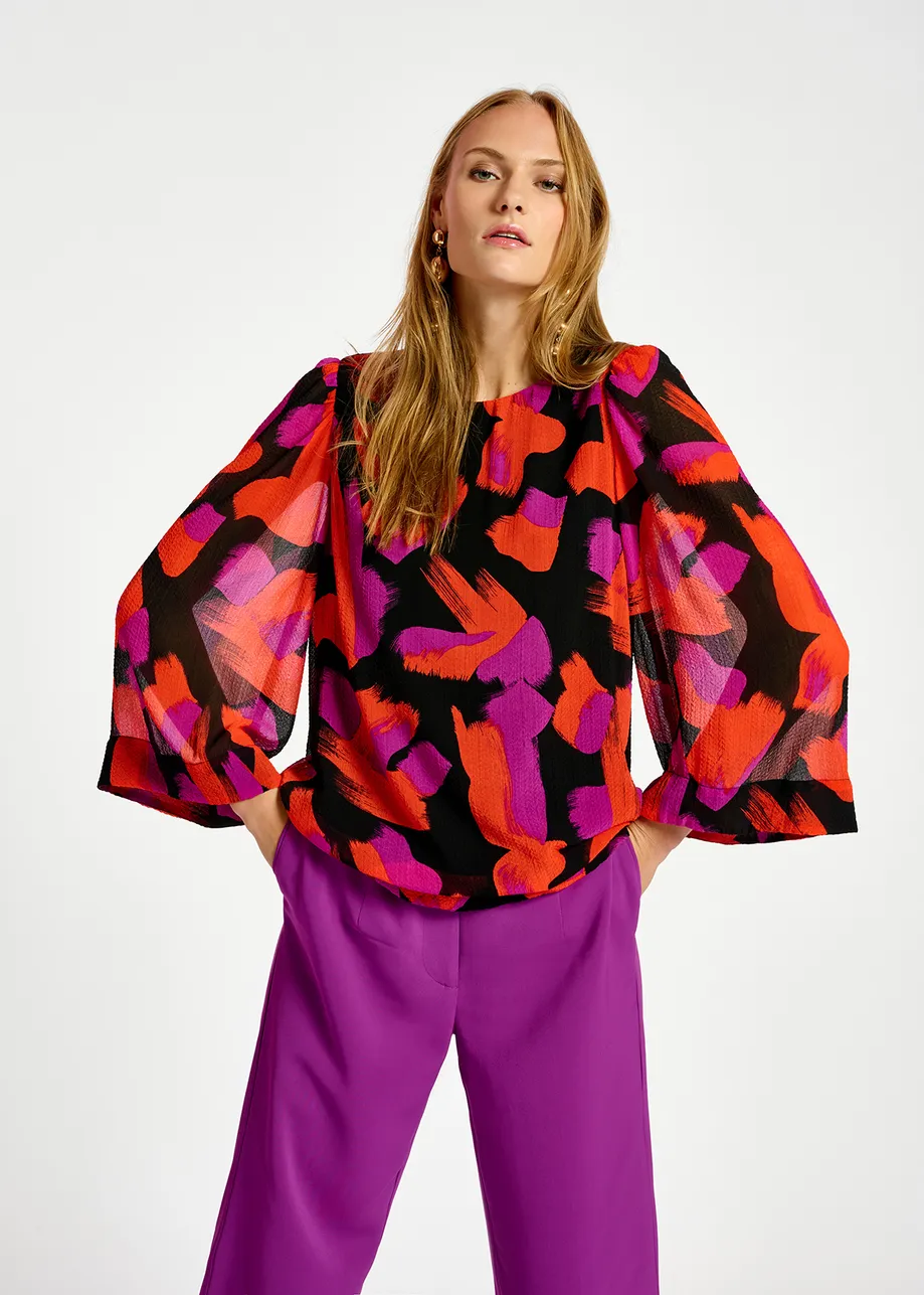 Black, orange and purple abstract-print top with puffed shoulders