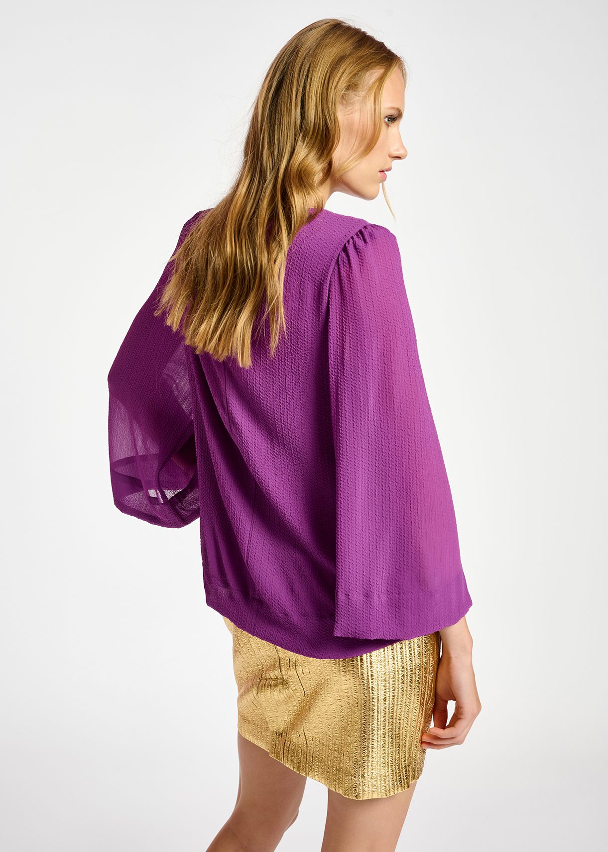 Purple top with puffed shoulders