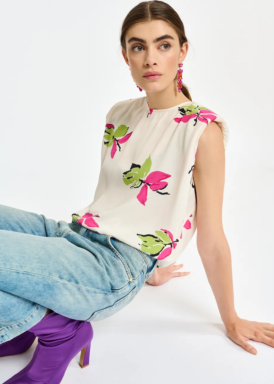 Off-white floral-print sleeveless top with padded shoulders