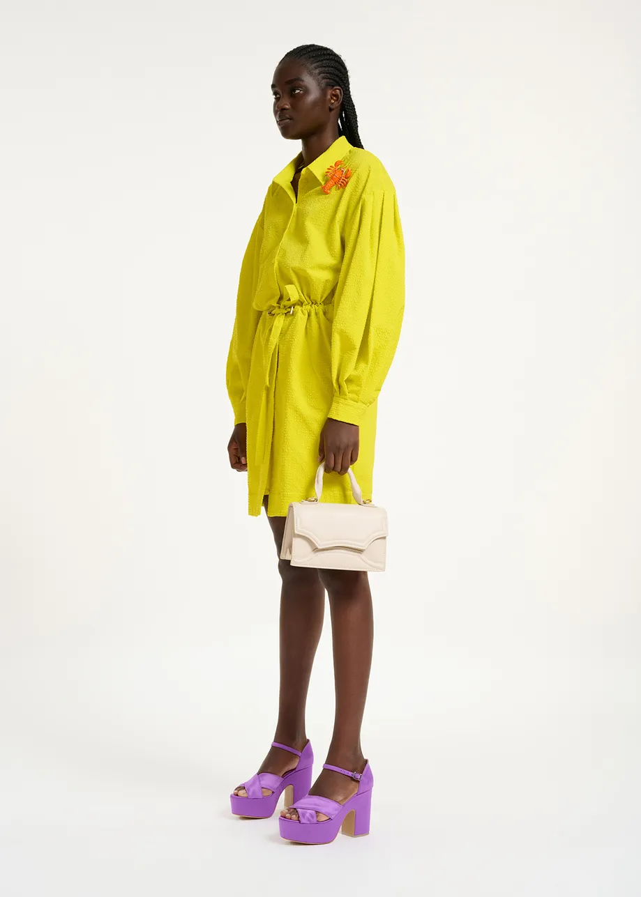 Yellow mini dress with voluminous sleeves
