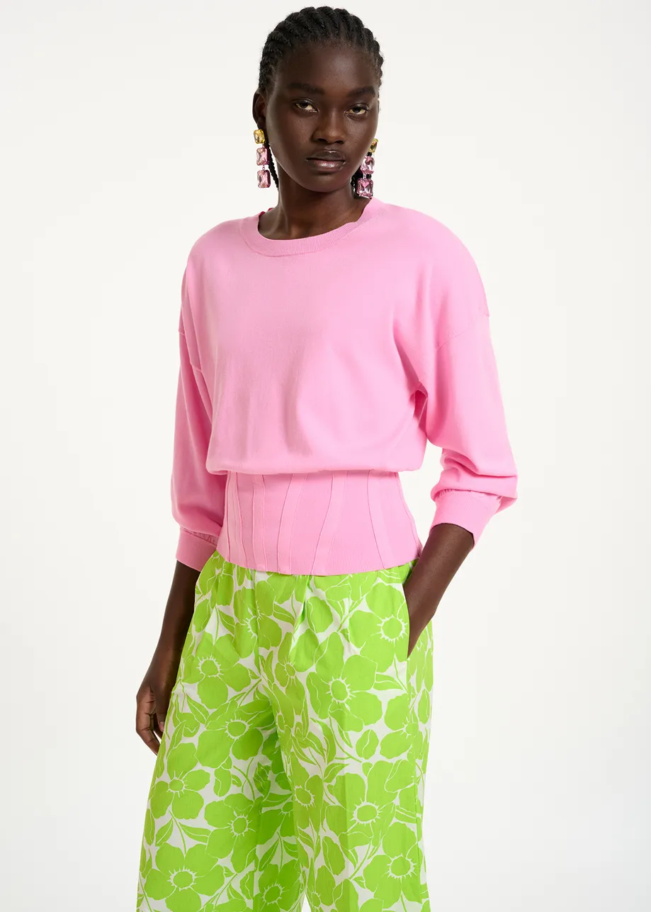 Light pink knitted sweater with fitted waist