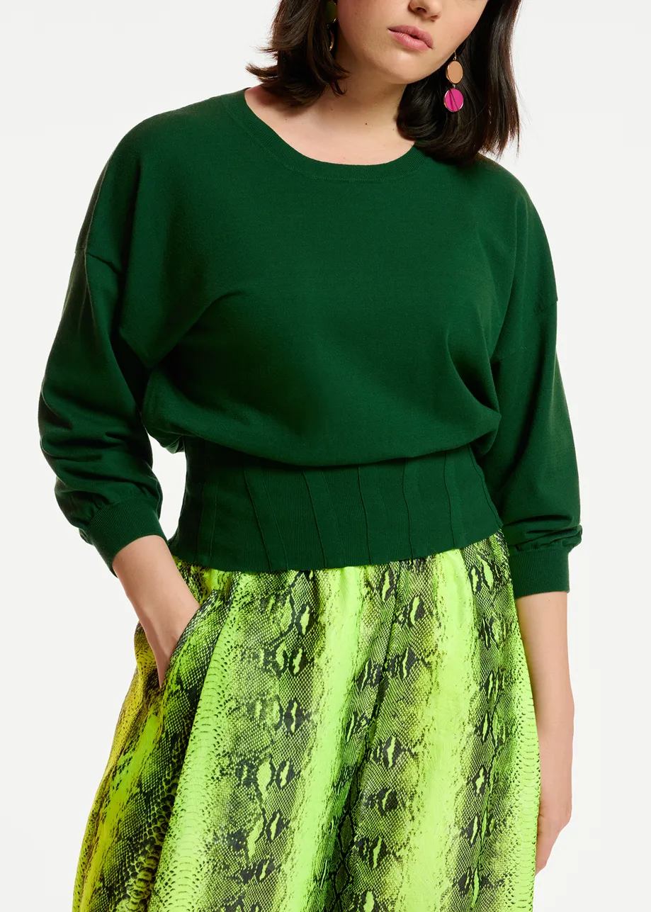 Pull vert foncé à taille cintrée