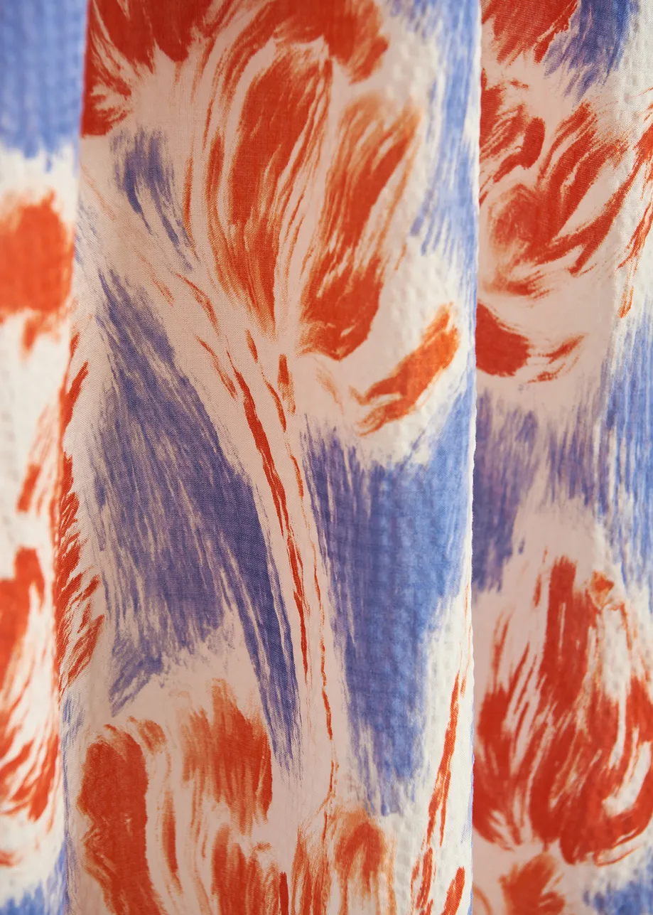 Light blue and orange floral print maxi-length dress