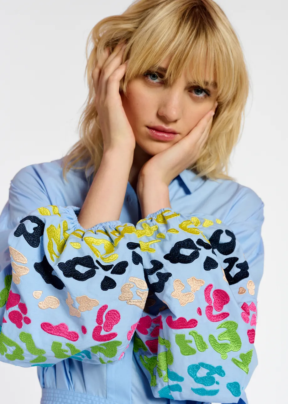 Blue cotton knee-length shirt dress with embroideries