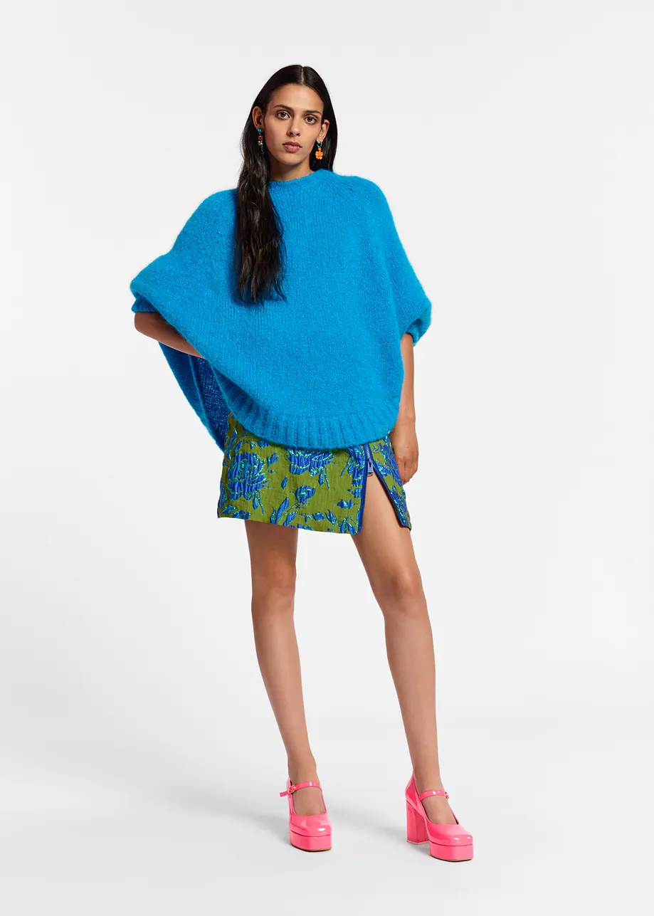 Blue knit sweater with cape effect