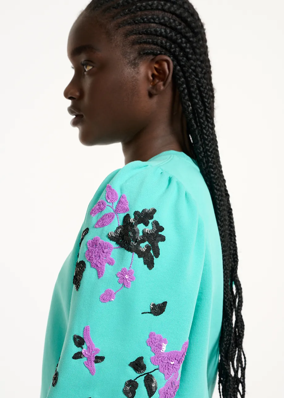 Blue sweatshirt with multicolor sequin embroideries
