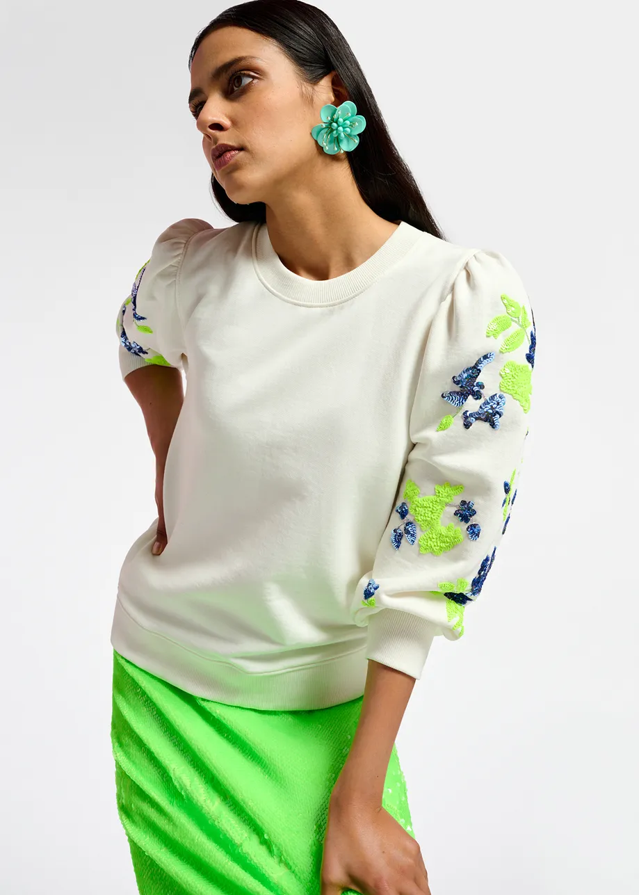 Witte sweater met kleurrijke pailletten