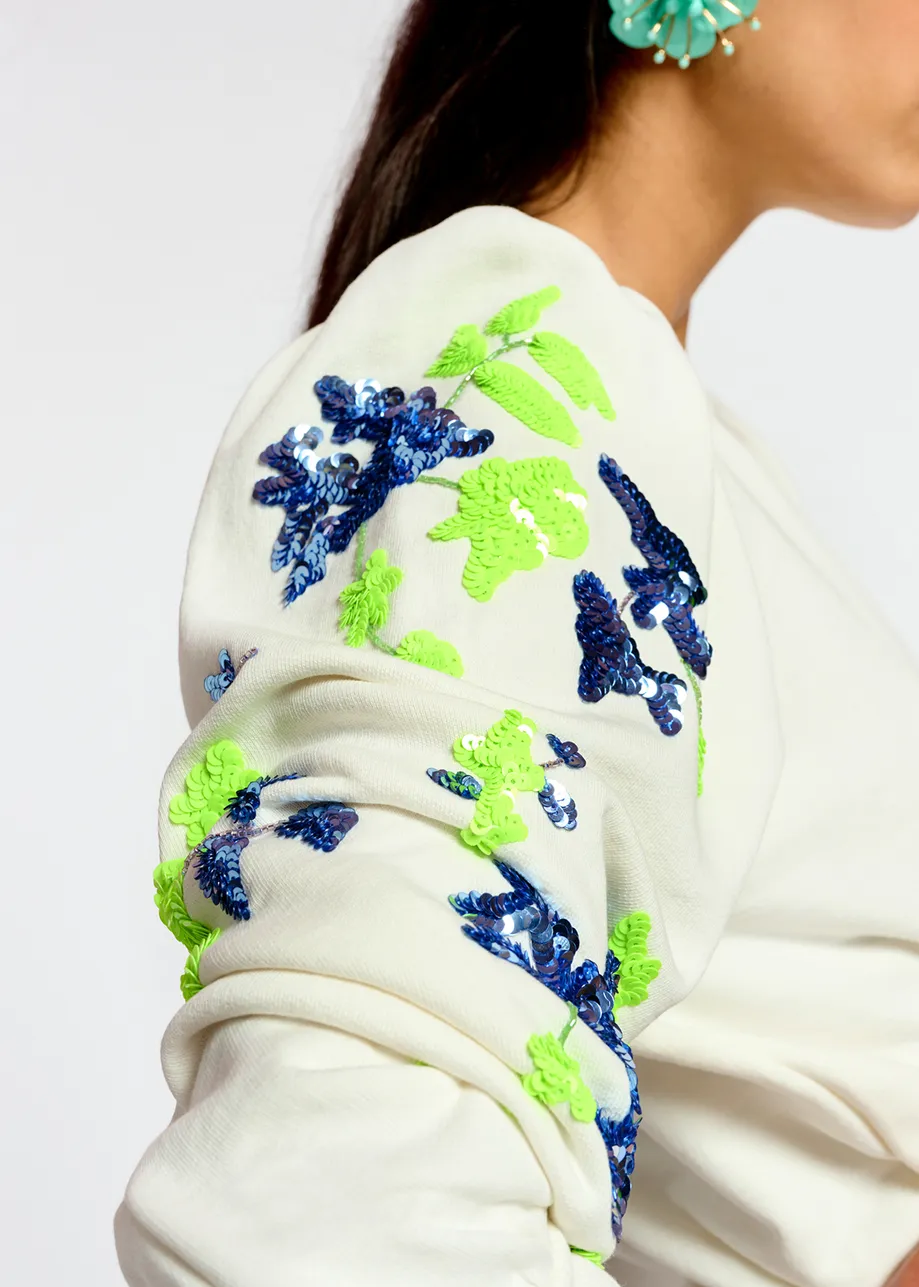 Witte sweater met kleurrijke pailletten