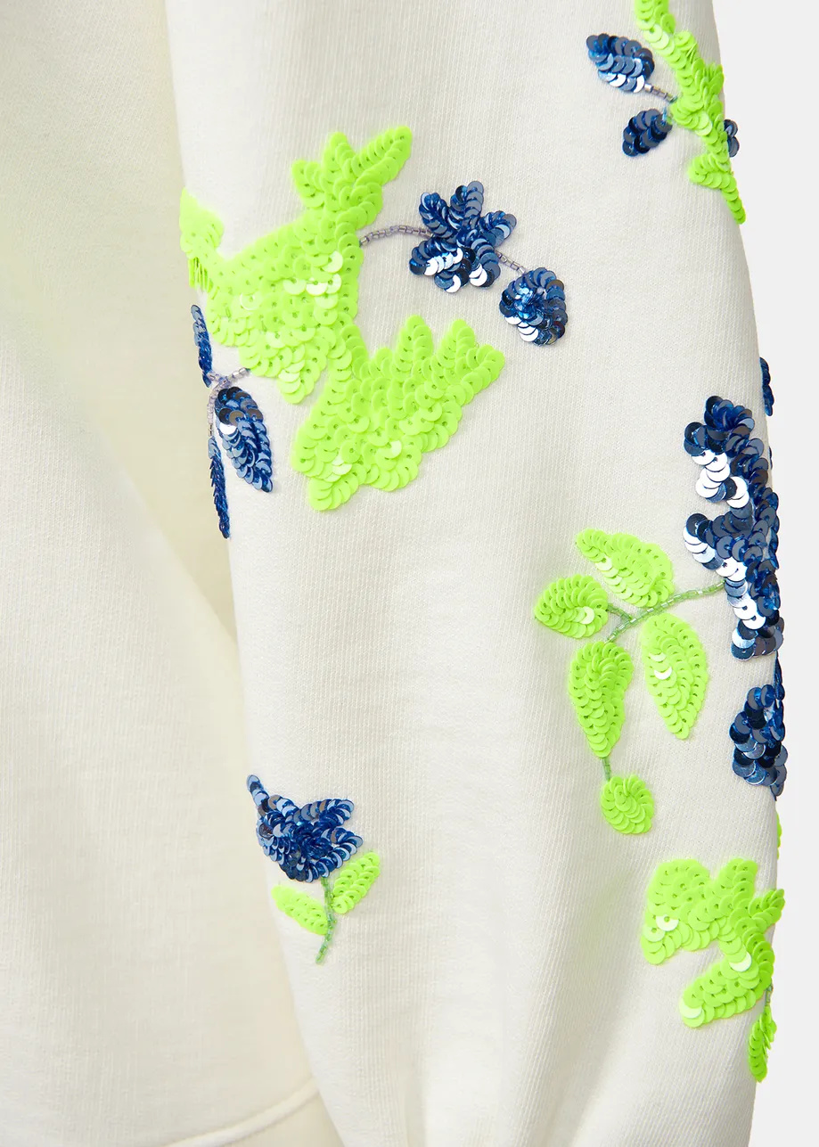 Witte sweater met kleurrijke pailletten