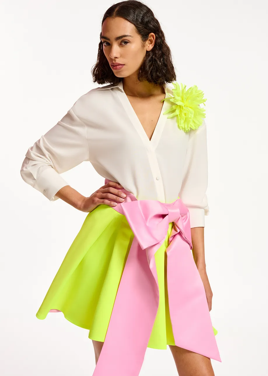 Yellow mini skirt with pink taffeta bow