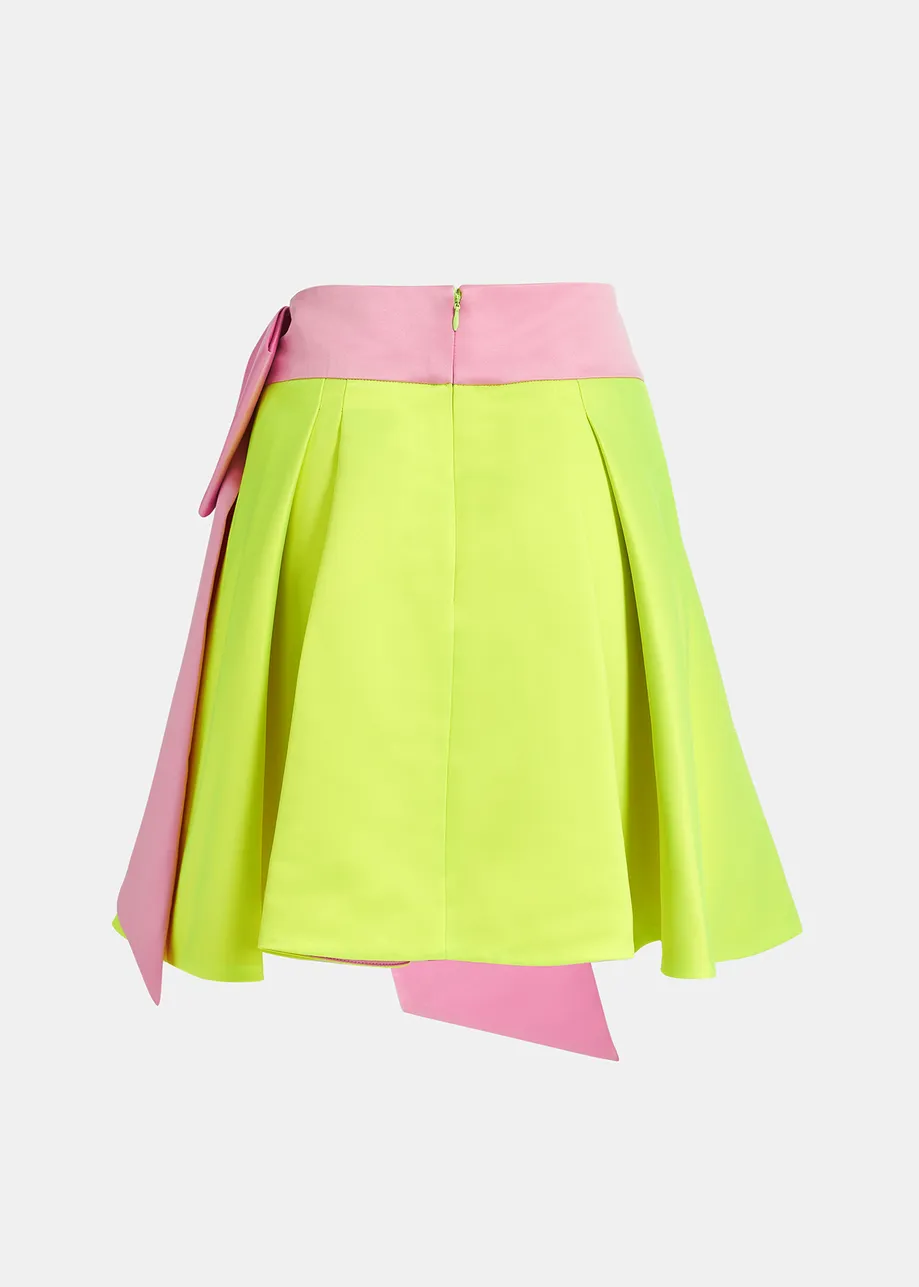 Yellow mini skirt with pink taffeta bow