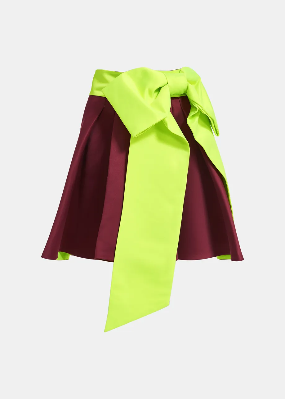 Mini-jupe bordeaux avec nœud jaune fluo