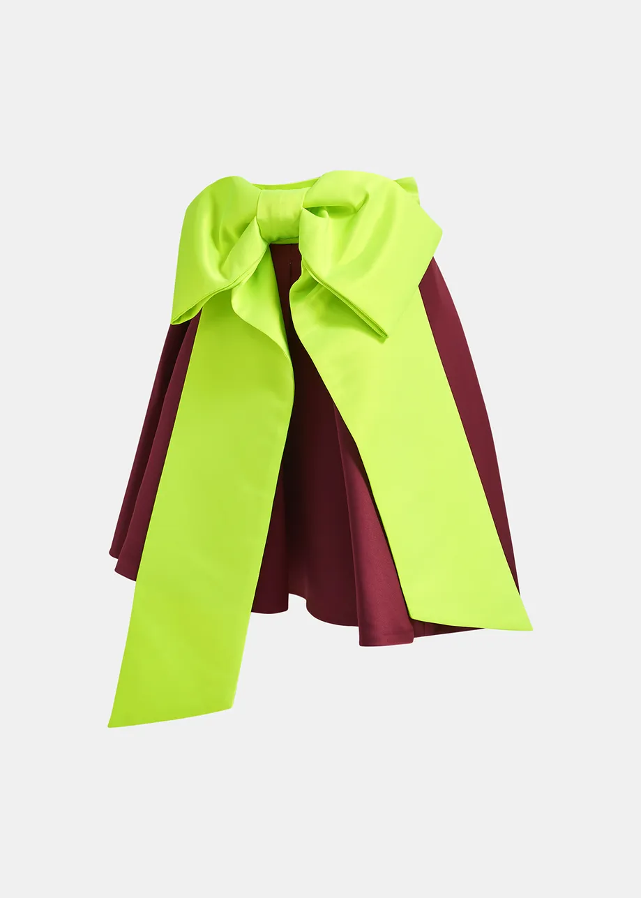 Mini-jupe bordeaux avec nœud jaune fluo