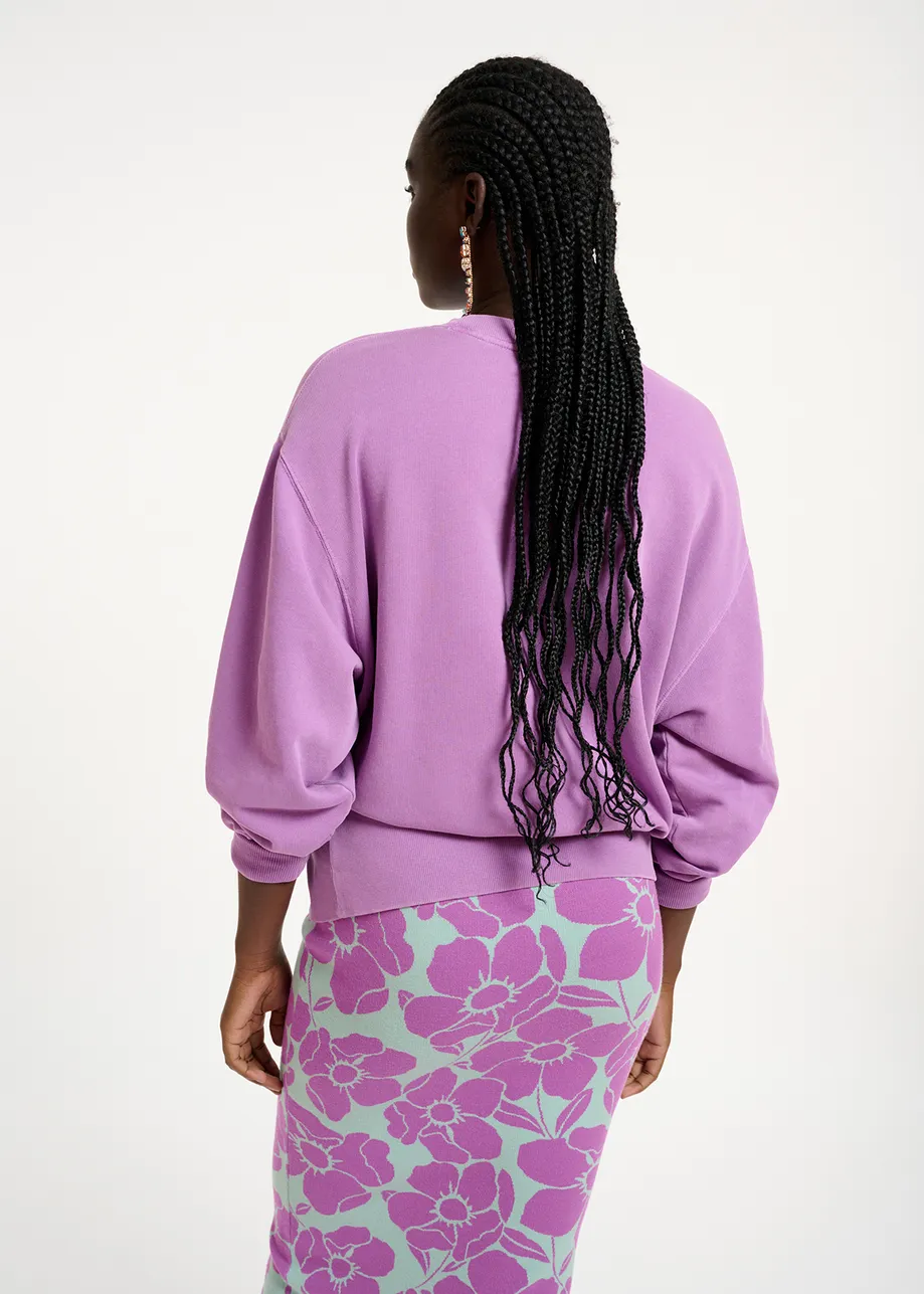 Paarse biokatoenen sweater met tekst