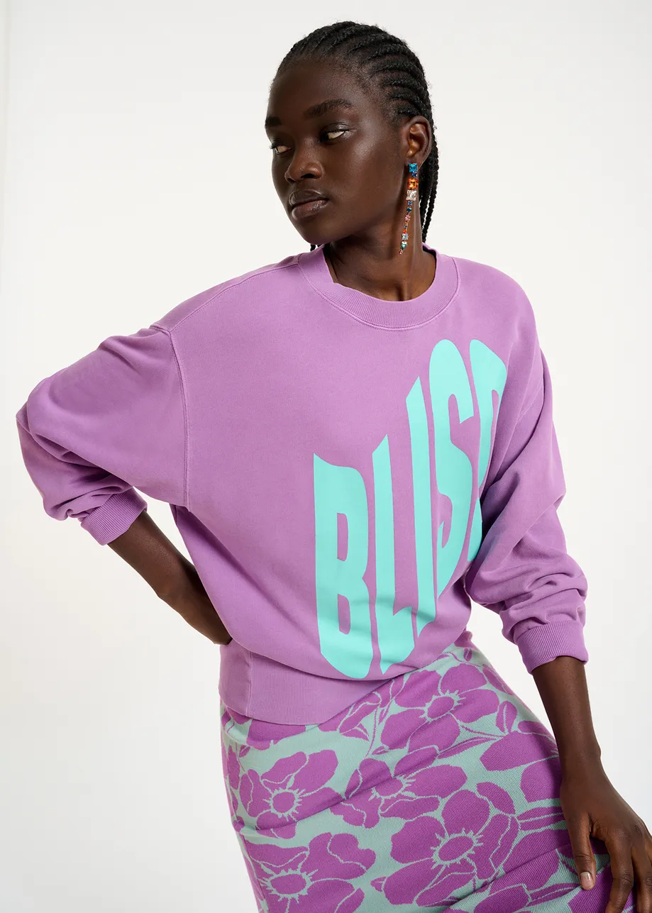 Paarse biokatoenen sweater met tekst