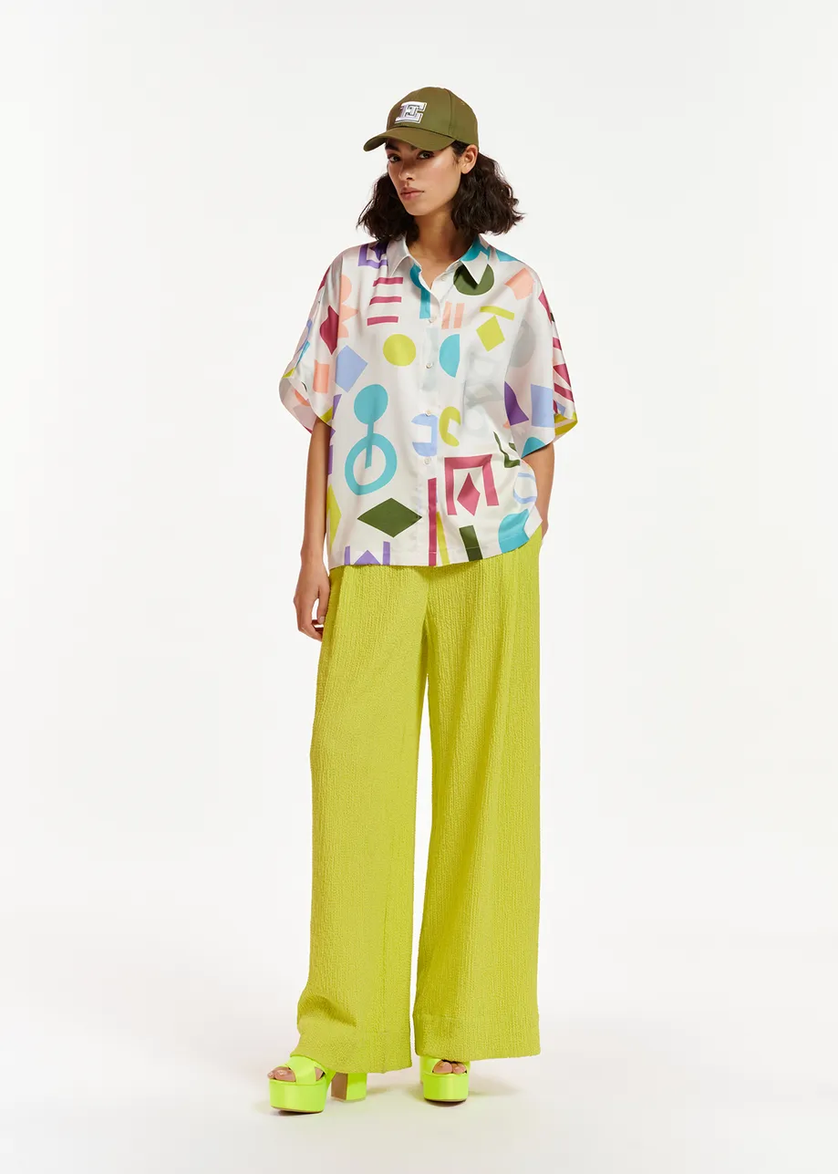 Lime green wide-leg seersucker pants