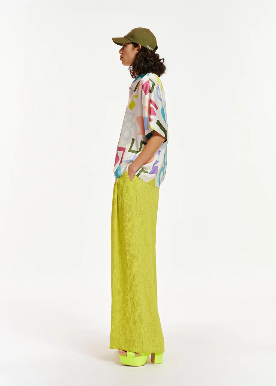 Lime green wide-leg seersucker pants